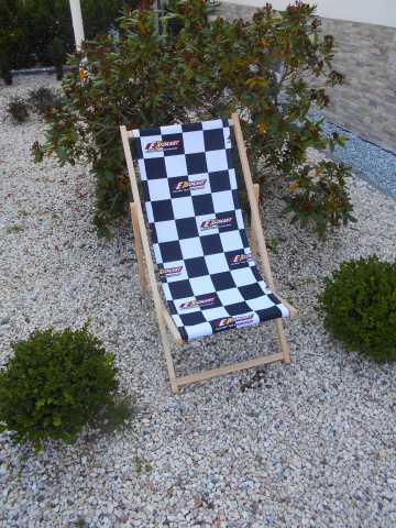 Tumbona publicitaria de carreras