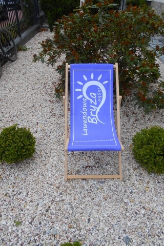 Tumbona publicitaria REACCIÓN